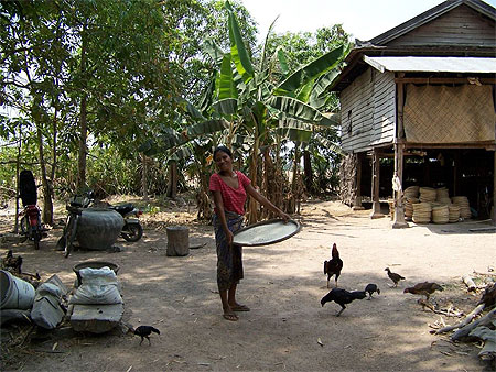 Le sourire du Cambodge et la paysanne