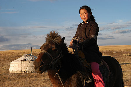 Jeune fille à cheval