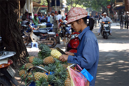 Vendeuse d'ananas