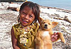 Enfant Kuna et son petit chien